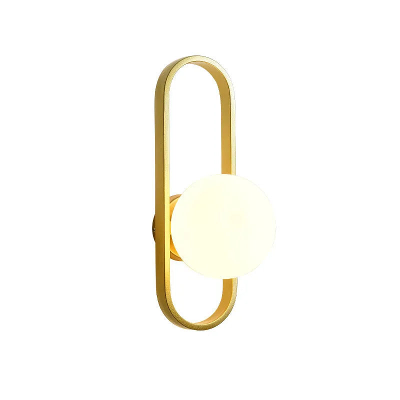 Minimalist wall lamp with glass shade and iron body in black or gold finish showing 12W tri-colour light source