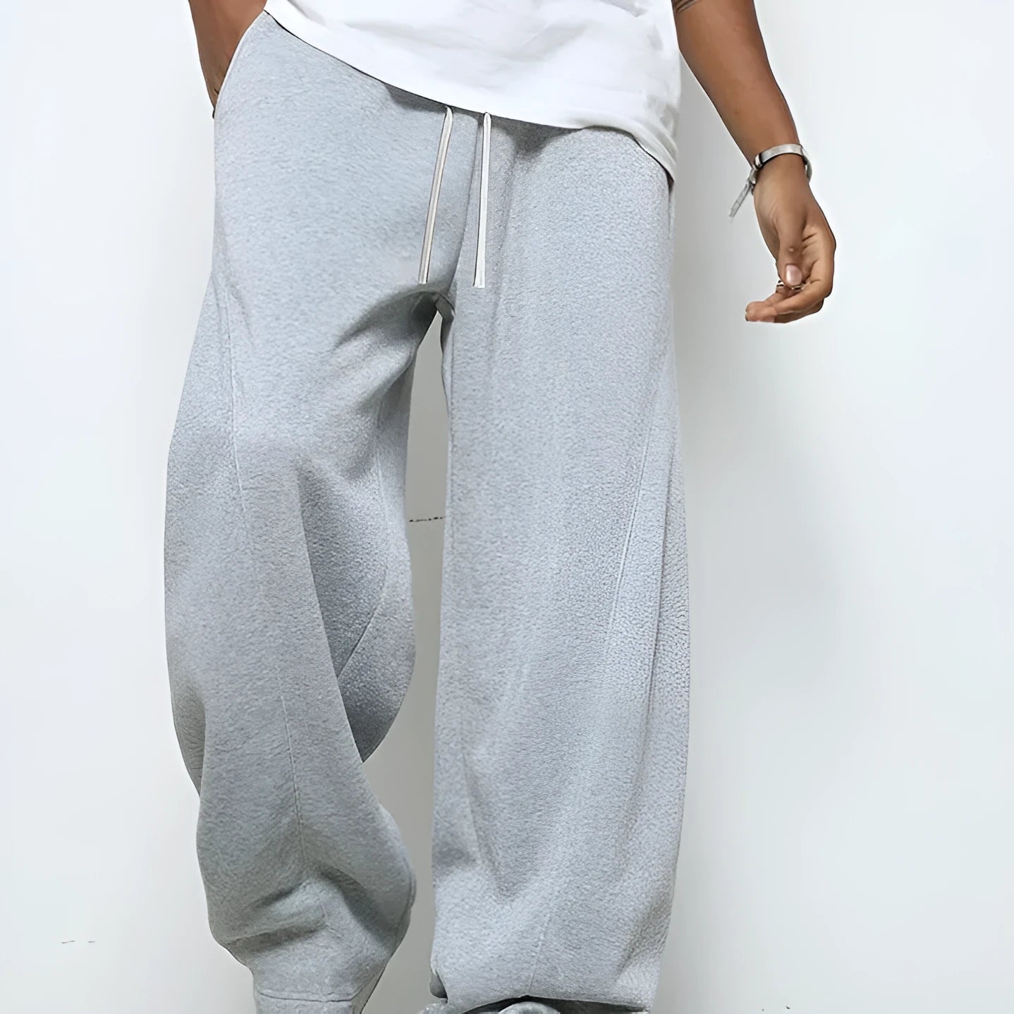 Men's solid colour casual trousers with an elastic waistband and straight leg in a grey shade.