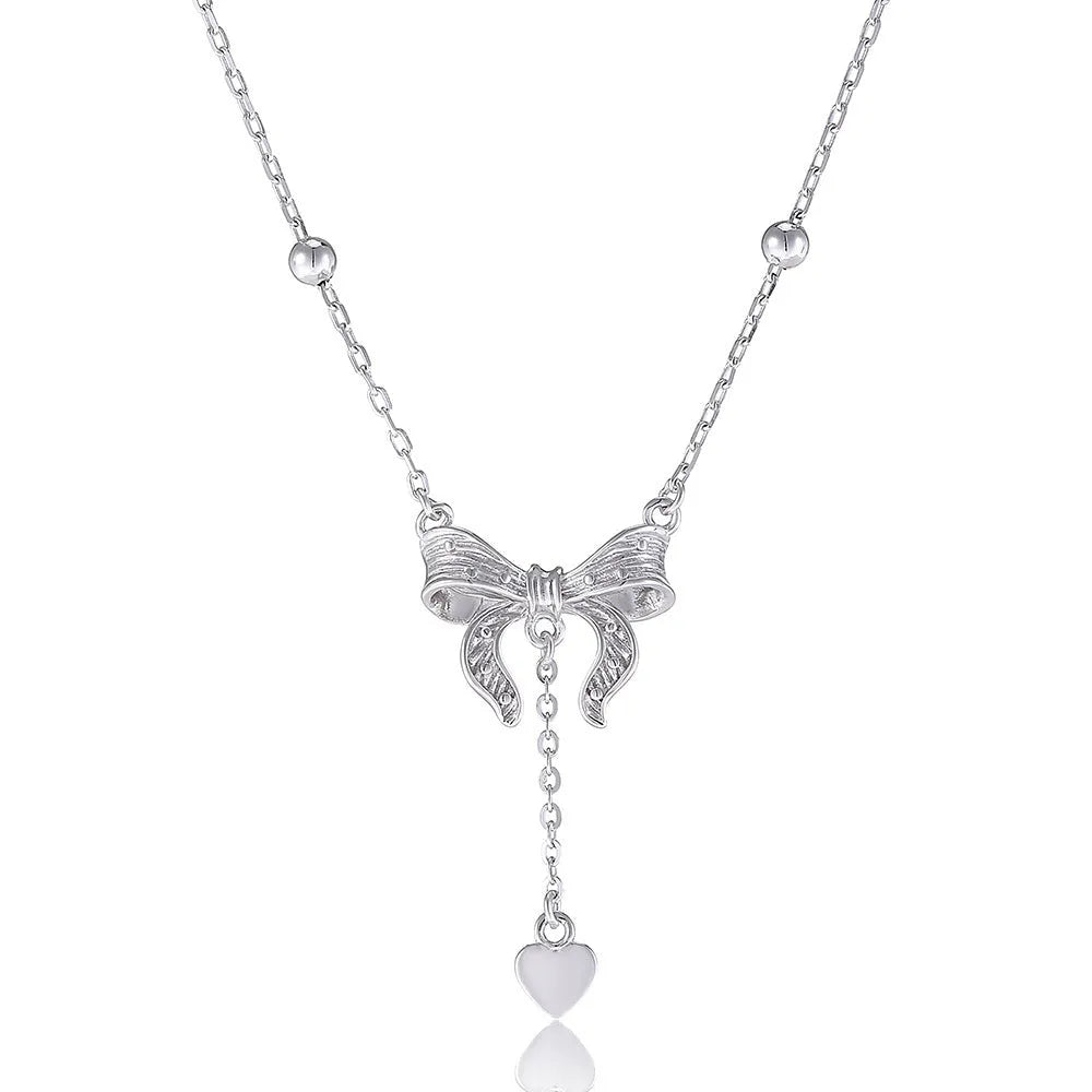 Women's 925 silver butterfly heart and bow pendant necklace on an adjustable O-ring chain.