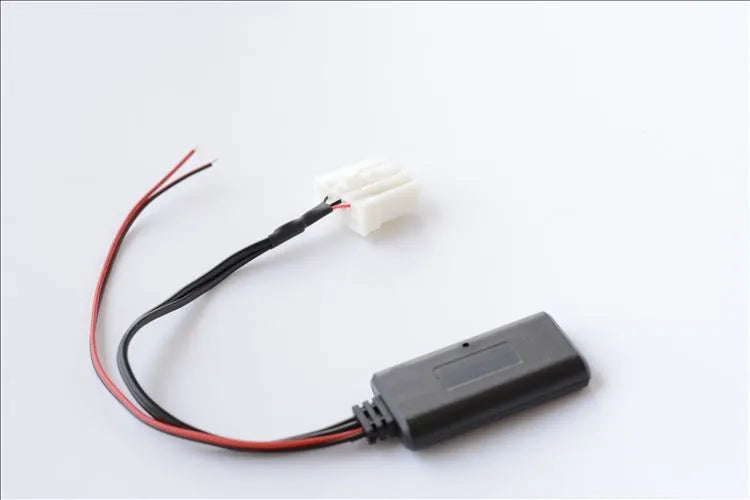 Black JieRui-BT 5908 Bluetooth audio cable for Mazda 3, M6, and other 2006+ models.
