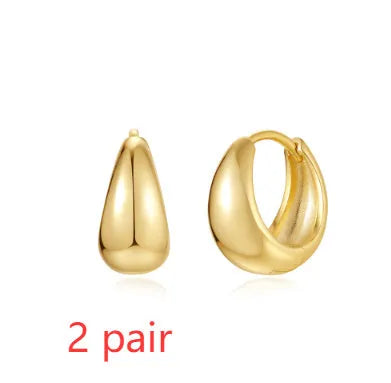 Gold electroplated brass earclip earrings with geometric round design in three style options