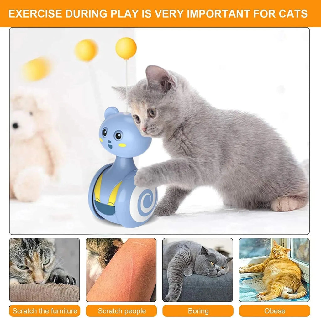 Blue cat feather wand toy with rotating ball bumbler design on pink background