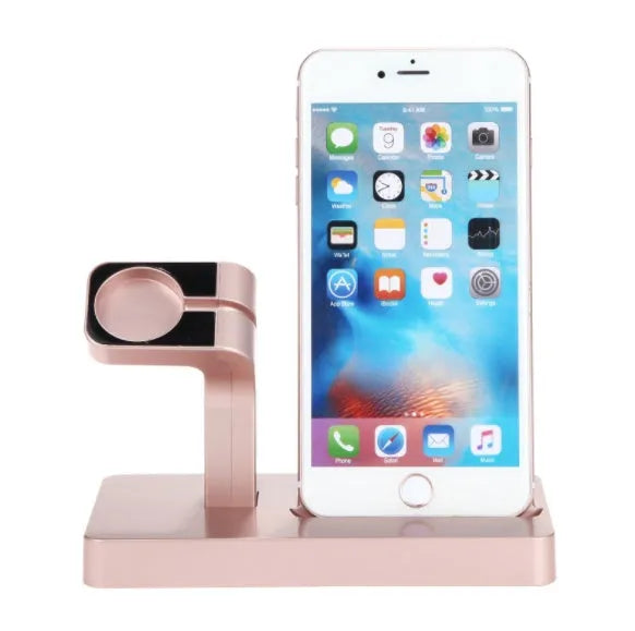 White 2-in-1 charging dock holding an iPhone and an Apple Watch on a wooden desk.