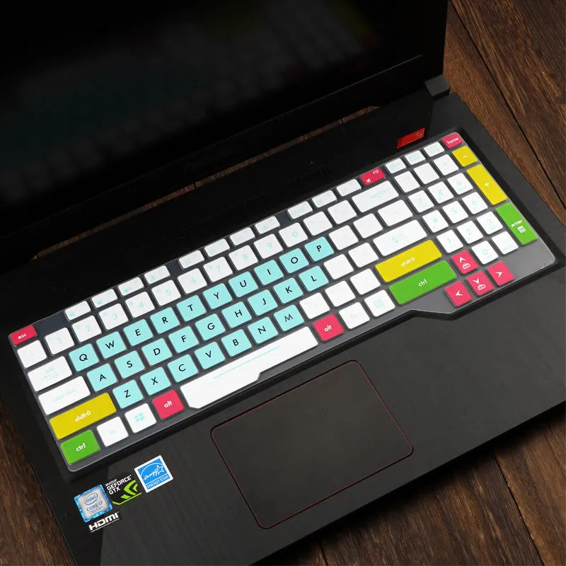 Transparent silicone keyboard protective film for ASUS Flight laptop on a keyboard.