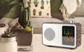 Brown wooden retro Bluetooth radio speaker with DAB and FM reception on wooden surface