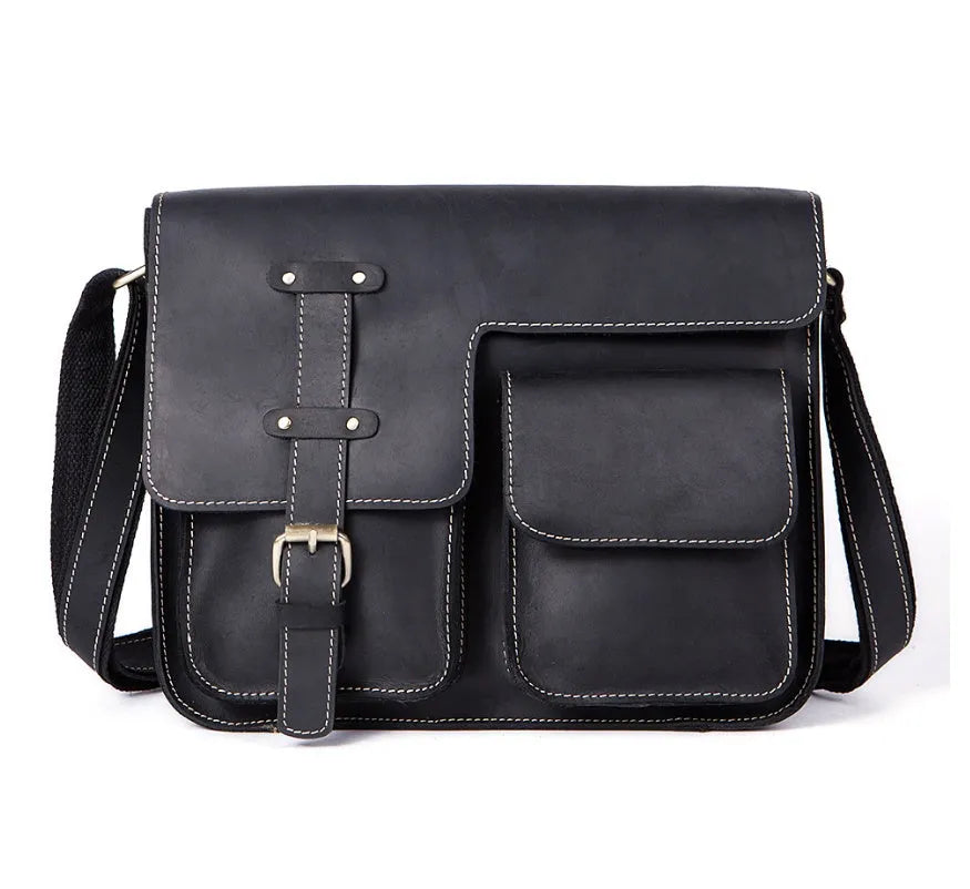 Brown leather vintage messenger bag with crossbody strap open showing laptop compartment
