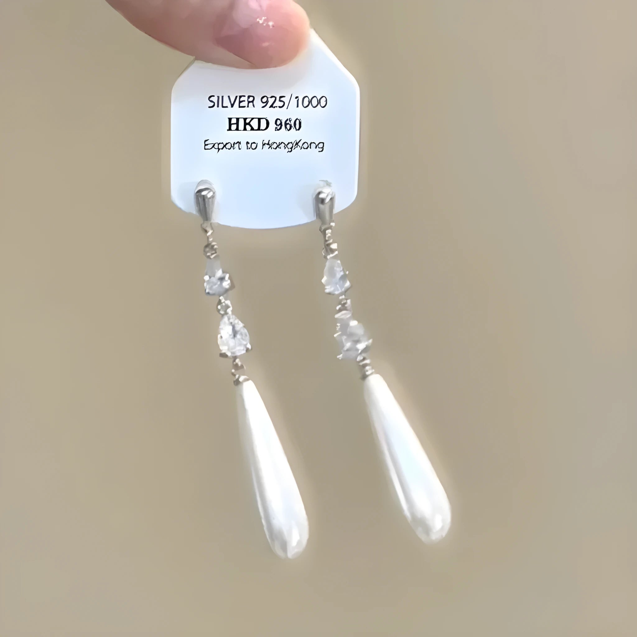 Geometric heart shape alloy earrings with rhinestone star tassel ear clip design for women