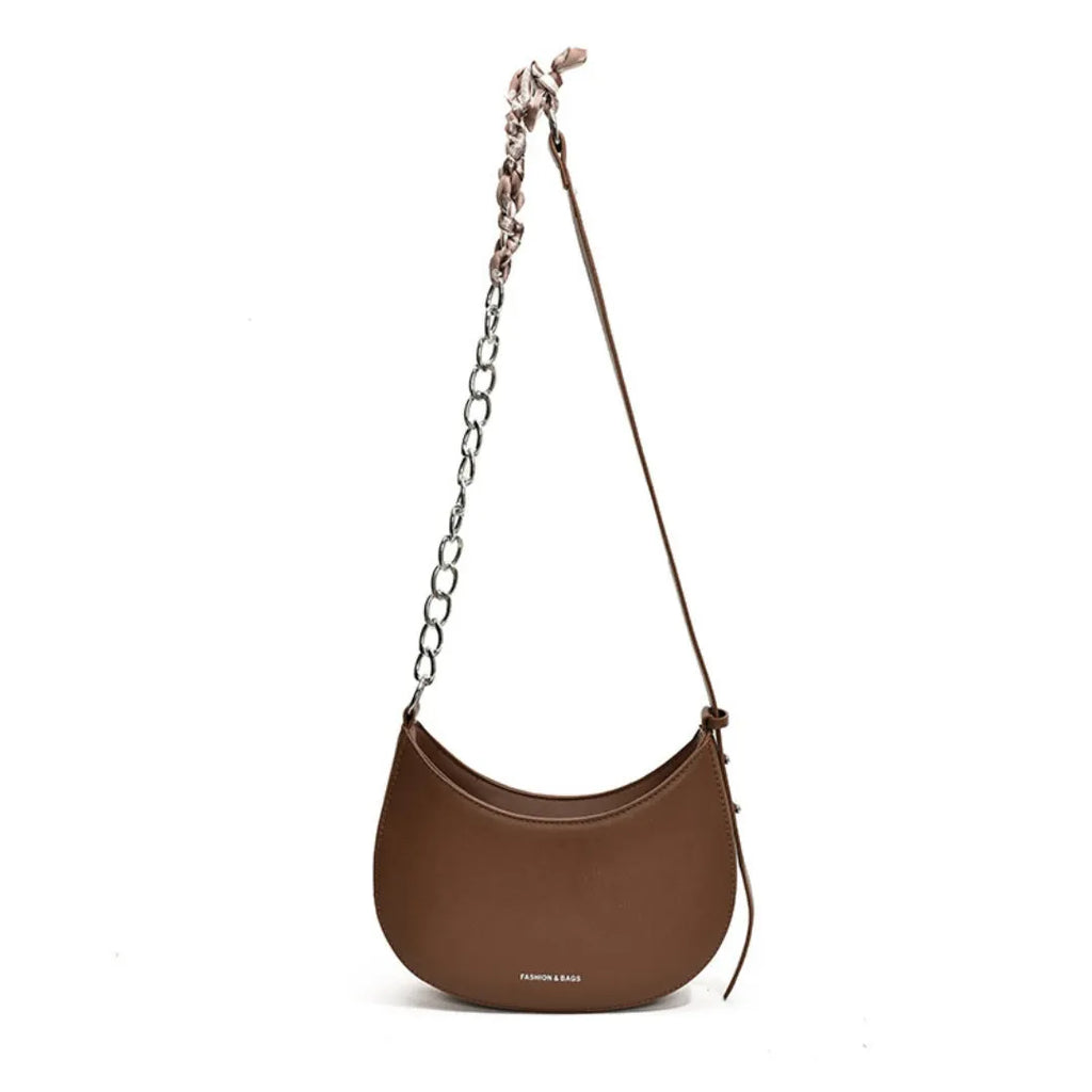 Small PU leather saddle bag on a flat surface, available in black, brown, coffee, green, khaki, and white