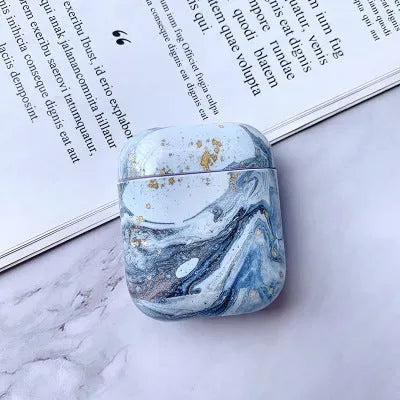 White marble pattern hard protective case for AirPods 1 and AirPods 2 wireless charging box.