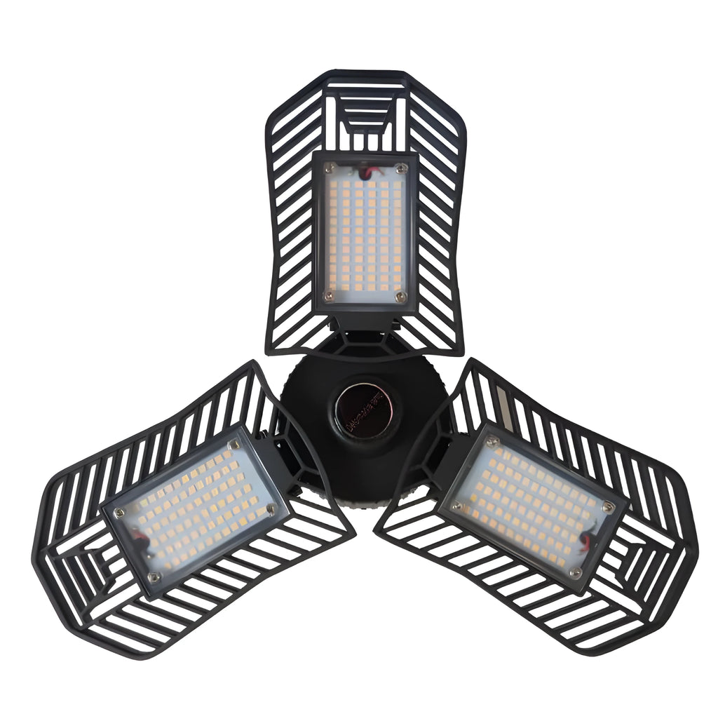 A foldable industrial LED garage flood light with a die-cast aluminum body, shown in a workshop setting.