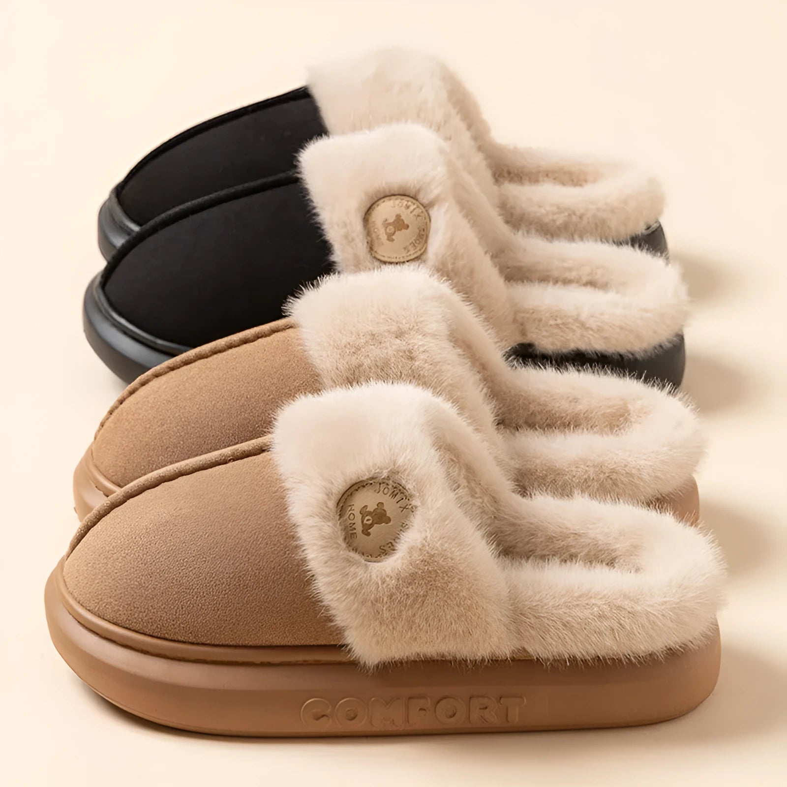 A pair of thick-soled plush fleece slippers in a chosen colour, showing decorative car stitching on the upper.