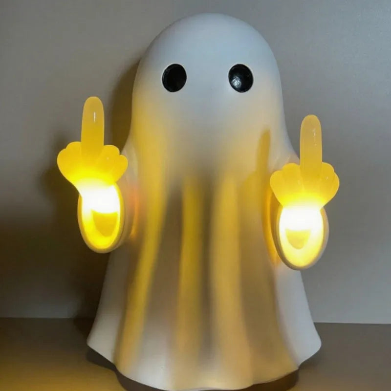 White ghost statue Halloween night lamp with LED lighting on black background