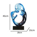 Transparent resin craft ornament in modern simplicity design, shown in orange red and blue colour options
