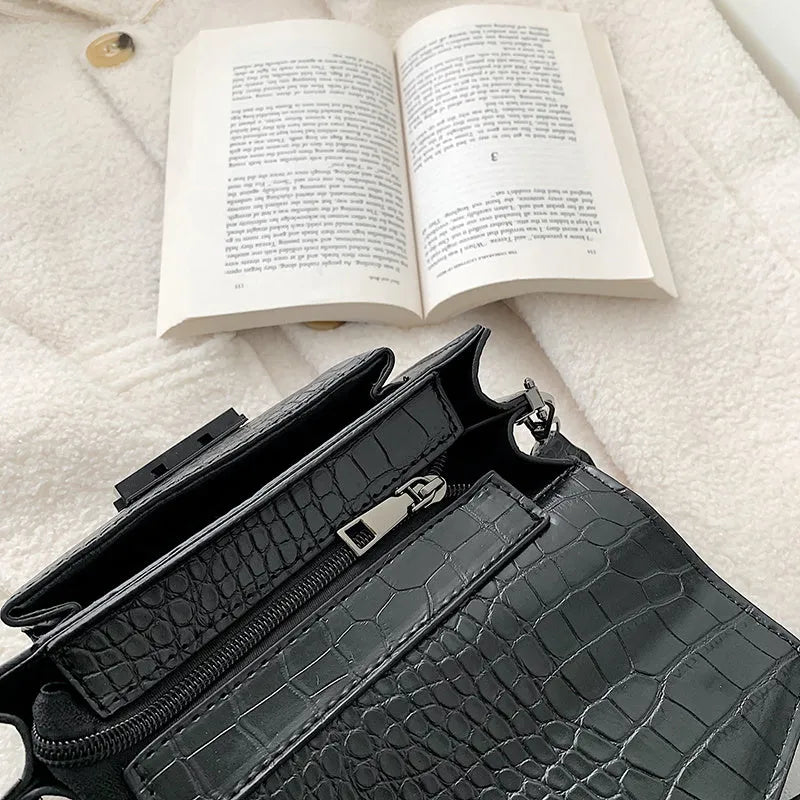 Vintage PU crossbody bag in black, shown with measurements and internal polyester lining