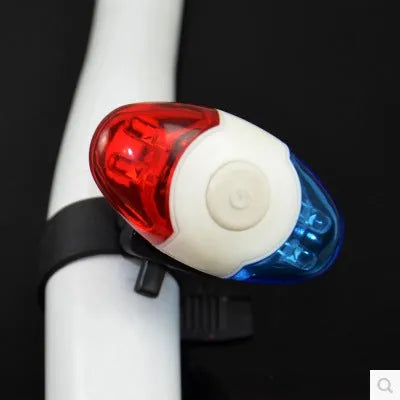 Red and blue LED bicycle tail light with adjustable mounting base in horizontal and vertical positions