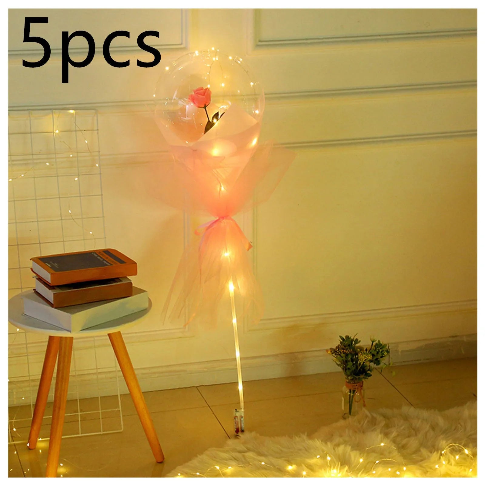 Transparent LED luminous balloon with artificial rose and built-in light, shown as a DIY bouquet kit.
