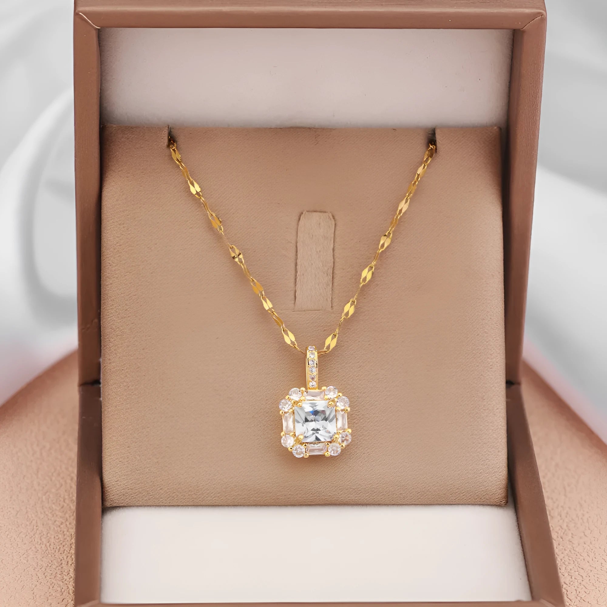 Women's titanium steel geometric necklace with quadrilateral gem-inlaid pendant on water wave chain