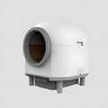 White automatic enclosed cat litter box with ABS plastic housing.
