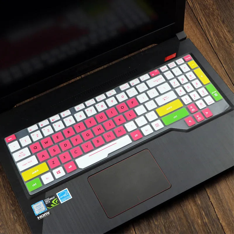 Transparent silicone keyboard protective film for ASUS Flight laptop on a keyboard.
