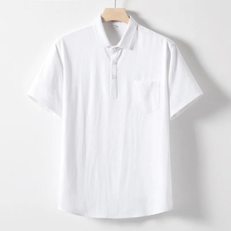 Man's loose-fit linen blend T-shirt in black, shown in a casual setting.