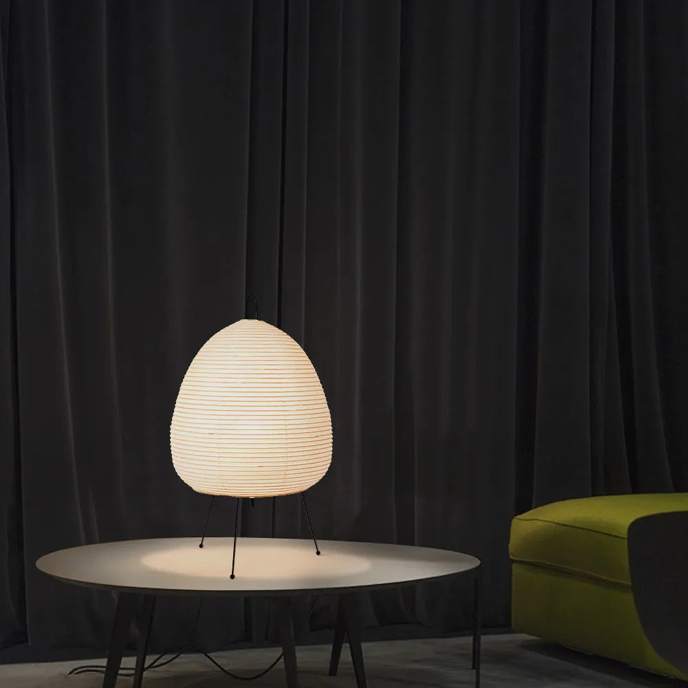 Handmade Nordic-style table lamp with a Japanese rice paper shade and aluminium base on a wooden table