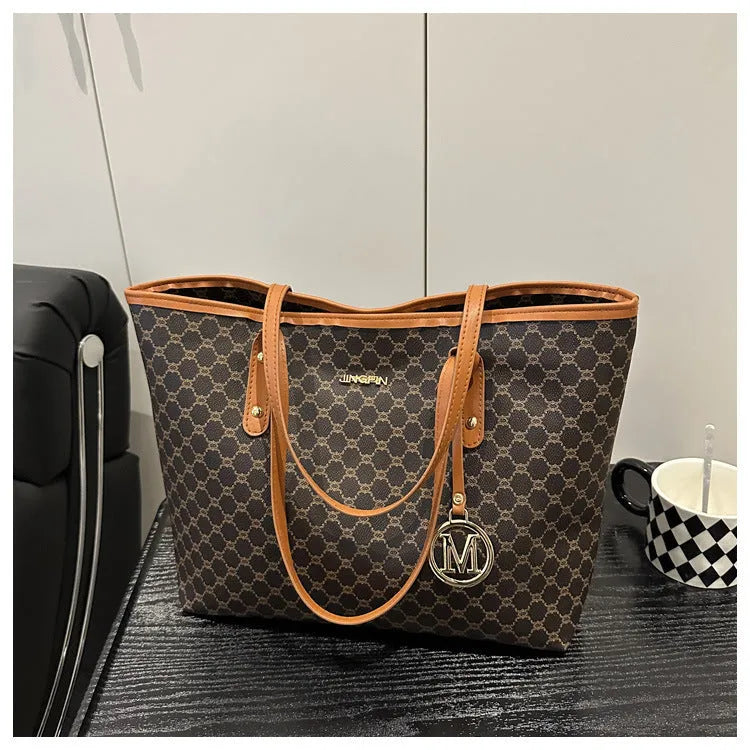 Street trend shoulder bag made from PU material with sewing thread decorative elements