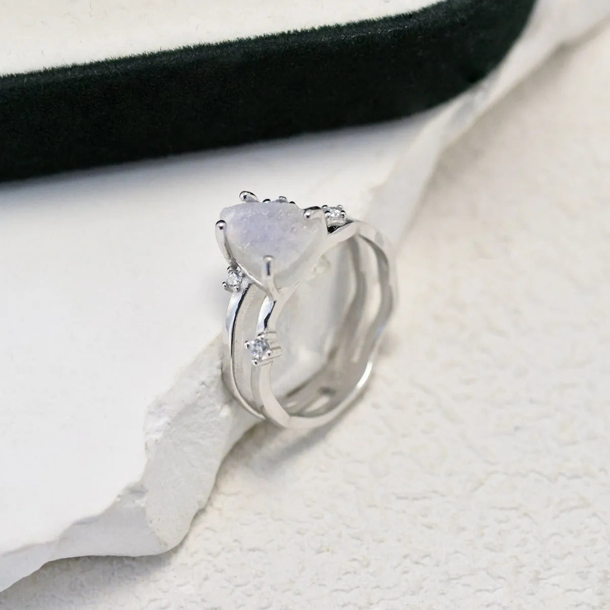 S925 silver geometric ring with irregular triangle design and moonstone detail in rose gold electroplating