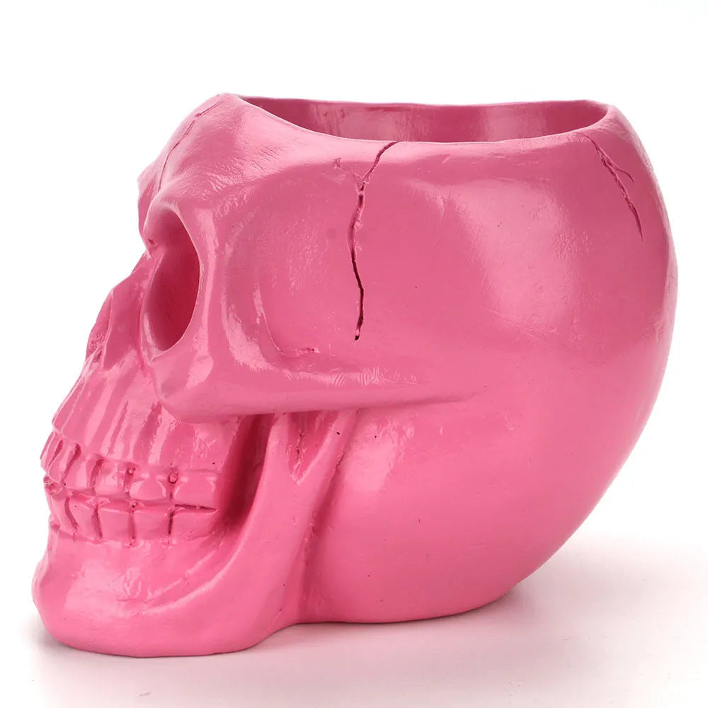 Skull head resin storage tube in black, 11x15x11cm, with open top showing inner 7cm diameter for storing beauty tools