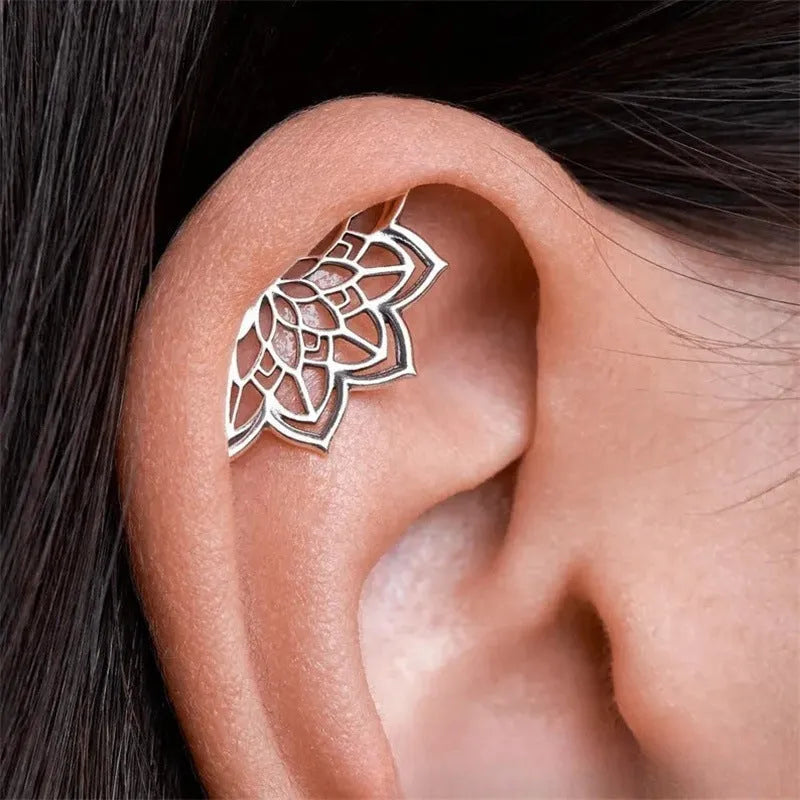 Spider web stud earrings with geometric mesh pattern in gold and silver electroplated colours