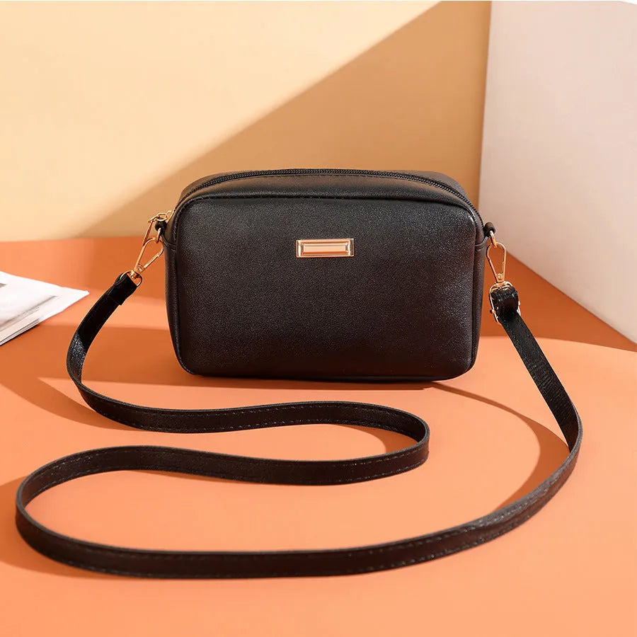 A square-shaped PU leather shoulder bag for women in an urban style, shown in multiple colour options.