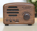 Vintage wood grain Bluetooth speaker with compact dimensions on wooden surface