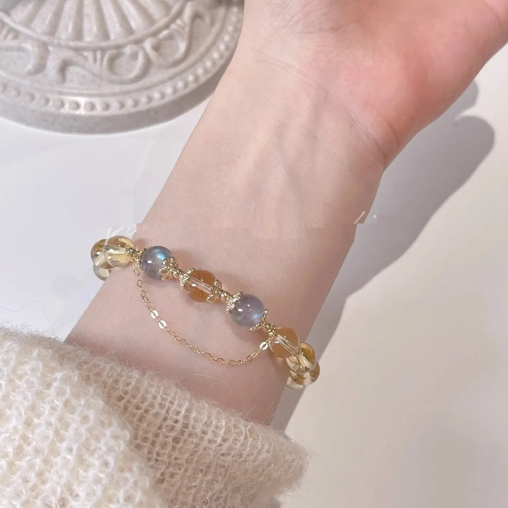 Chinese style crystal bracelet with 14K electroplated gilding and diamond-shaped citrine moon coloured elements