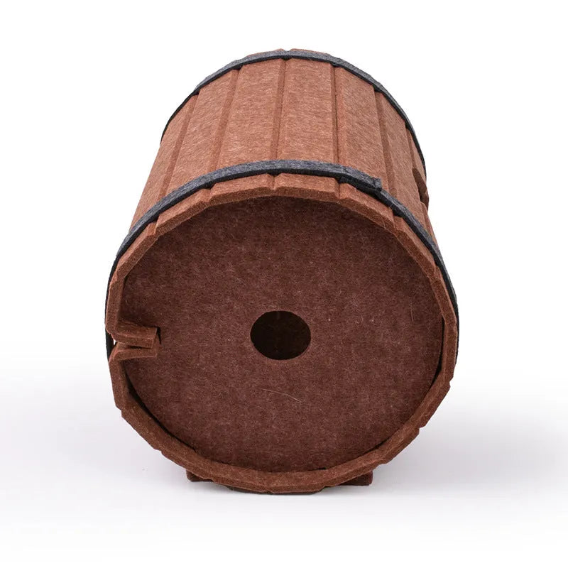 Assembled grey felt wine barrel-shaped pet bed for cats and small dogs.