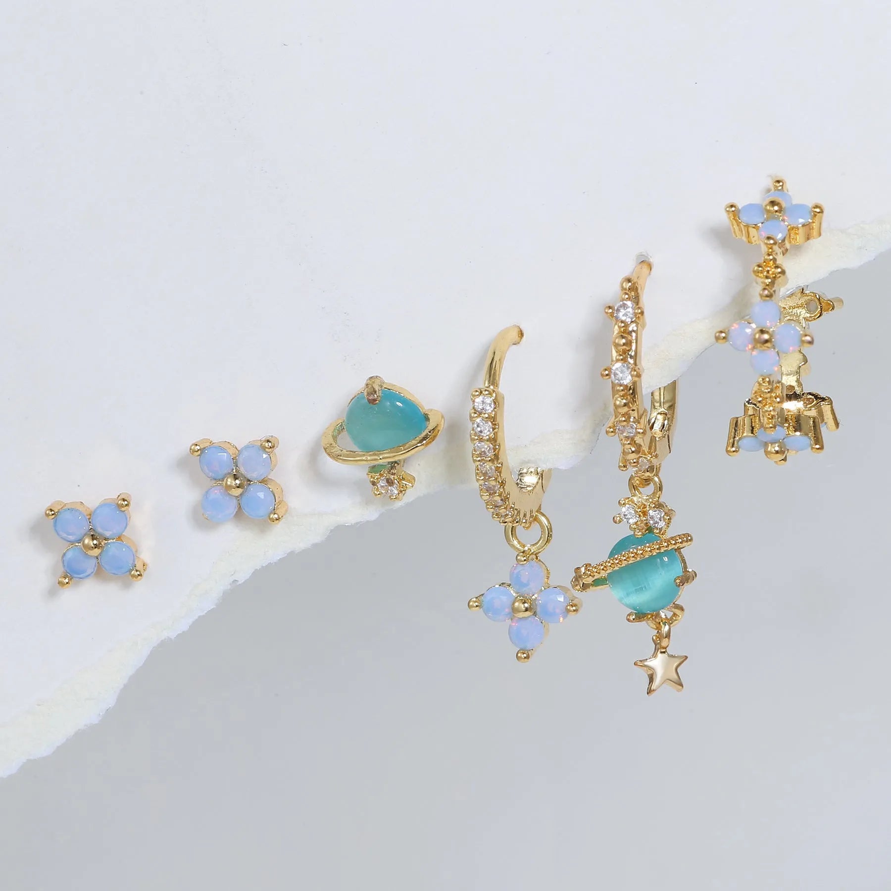 Gold or silver flower ear studs with zircon mosaic centre detail geometric design