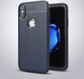 WeFor black PU leather texture slim silicone case for OnePlus 6 mobile phone on a table