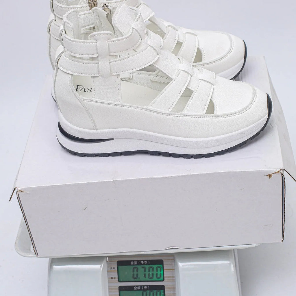 Women's black platform sandals with hollow-out design and Velcro fastening