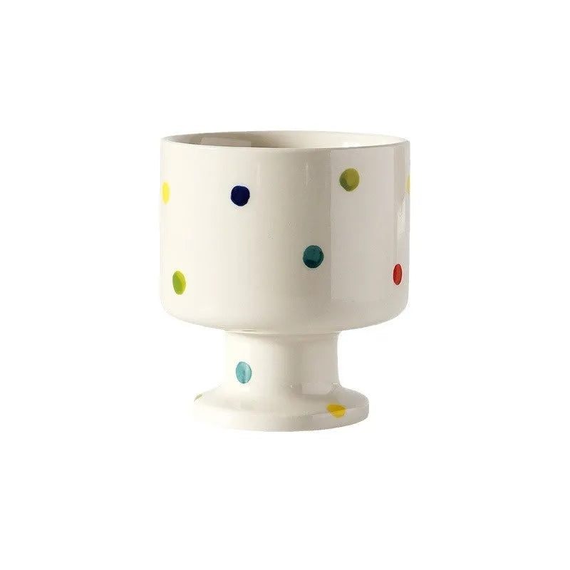 Hand-pinched irregular ceramic mug with solid colour design, approximately 14.5cm tall