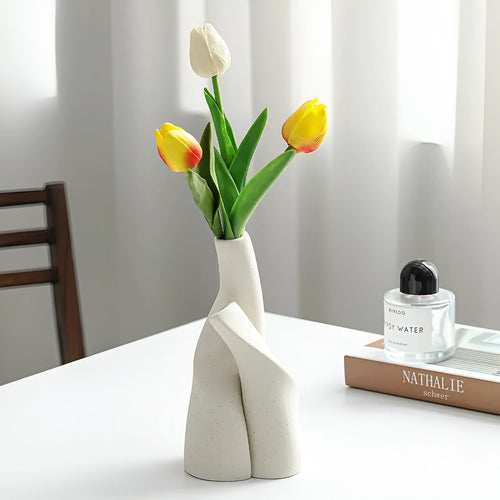 Ceramic shaped double vase in cream colour for Nordic home decoration on shelf