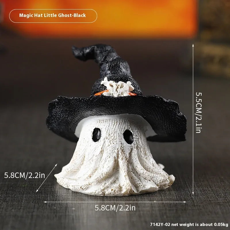 Resin wizard hat holiday ornament in purple or black, 7cm tall.