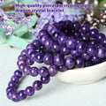 Natural purple charoite crystal bracelet with platinum details, showing different bead size options.