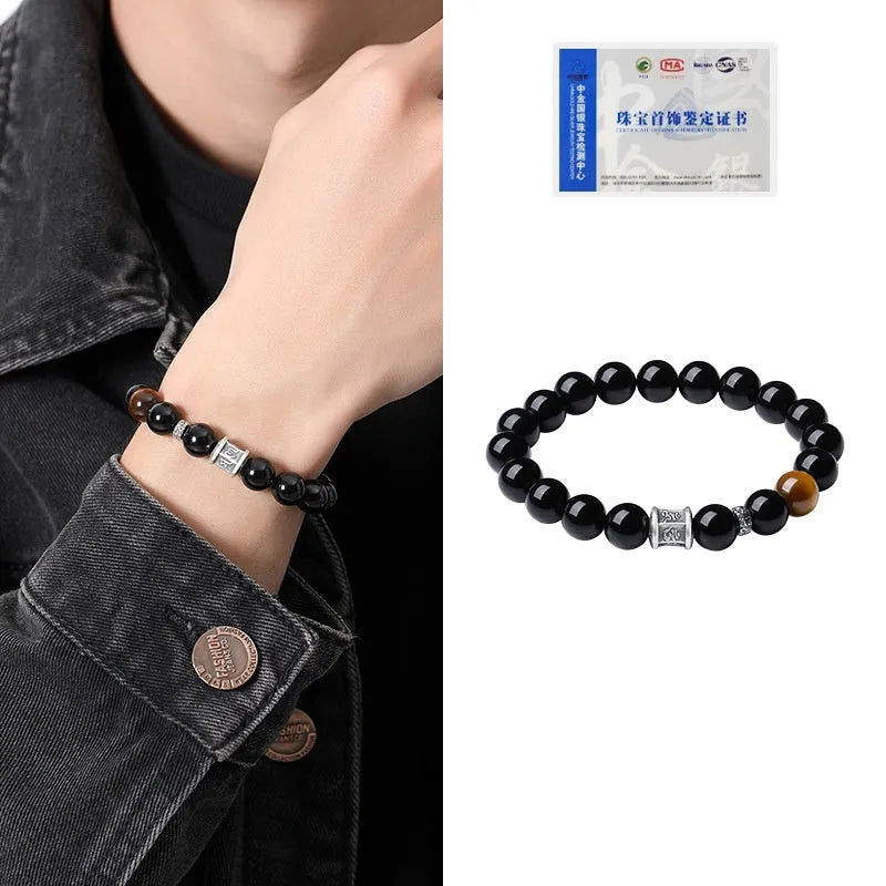 Men's obsidian and pure silver bracelet with a 10mm mantra prayer wheel bead.