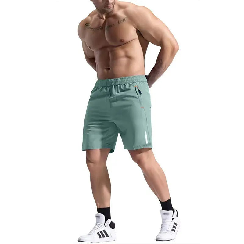 Men's grey bamboo fibre elastic waist sports shorts with a drawstring on a plain background