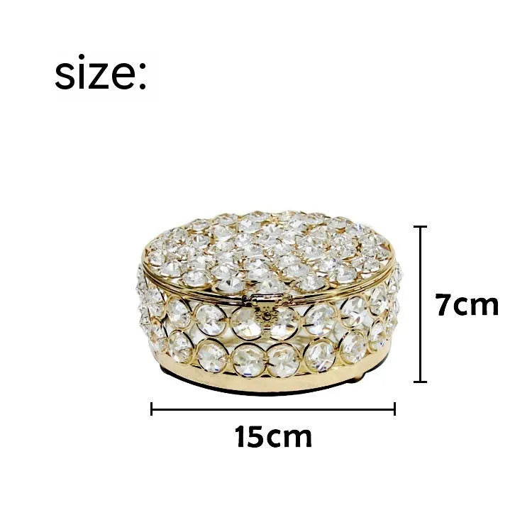 French gold metal frame jewellery box with transparent crystal glass panels displaying contents