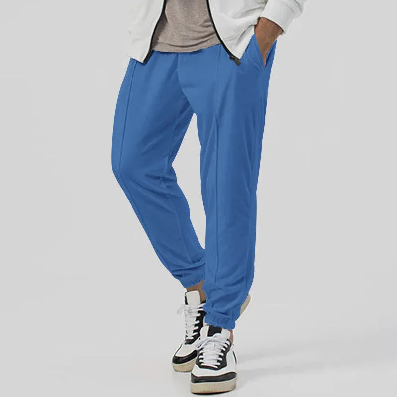 Men's casual track sweatpants in loose tapered straight-leg design showing army green colour option