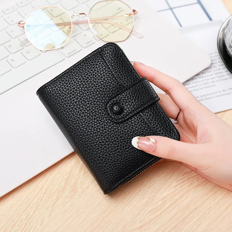 Ladies' short wallet with lychee pattern in beige, showing 2-fold design and card slots