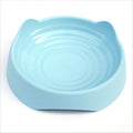 Blue ceramic dog slow feeder bowl with raised maze pattern inside for slowing down fast eaters.