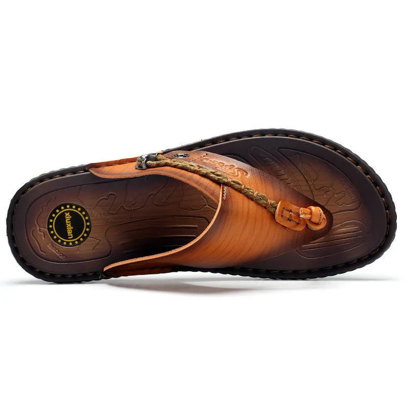 Men's dark blue herringbone-patterned outdoor slippers with a rubber sole, shown from the side.