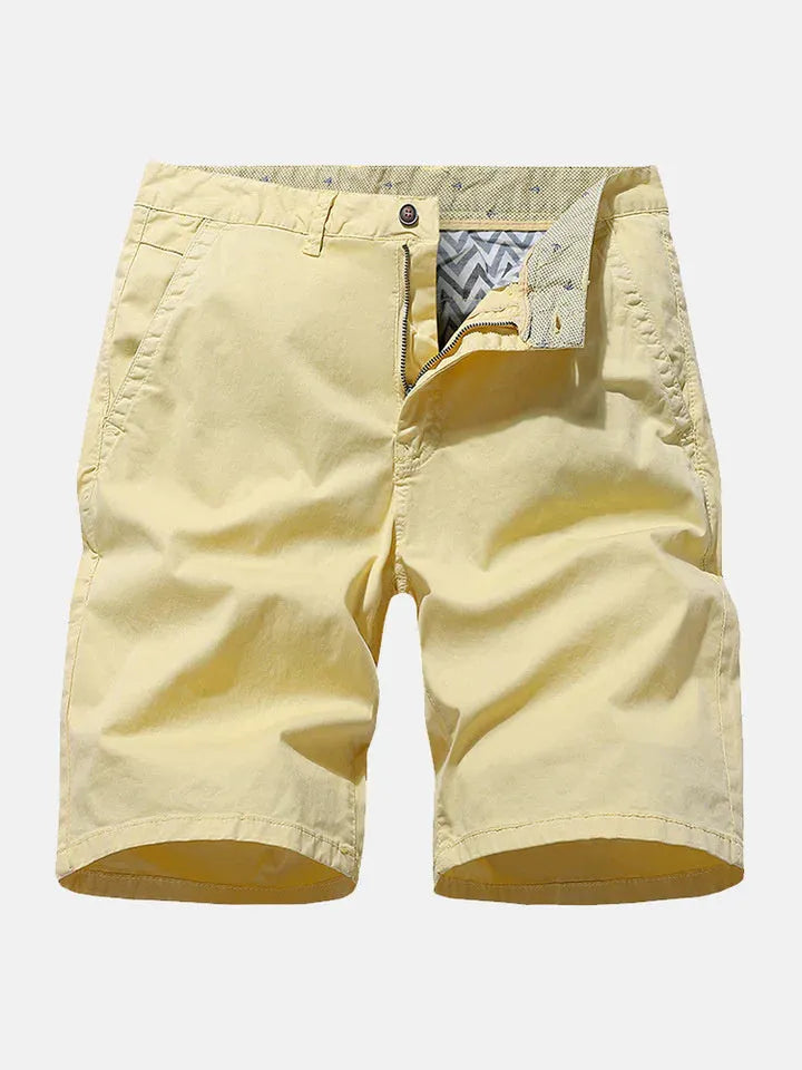 Men's loose fit blue denim casual shorts with no belt, shown in a straight cut short length