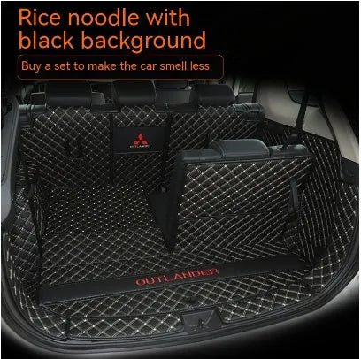 Mitsubishi Outlander custom boot liner with 3D raised edges and non-slip surface in a vehicle boot.