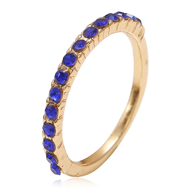 Simple retro trendy ring for women in sapphire blue KC gold with diamond treatment and line pattern
